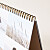 Calendrier chevalet détail spirale bronze Calendrier chevalet détail spirale bronze