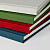 Dos des carnets rouge, vert, beige et bleu Dos des carnets rouge, vert, beige et bleu
