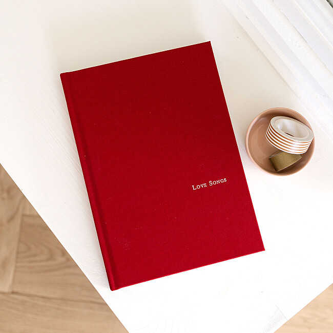 carnet tissu avec dorure en bas à droite carnet tissu avec dorure en bas à droite